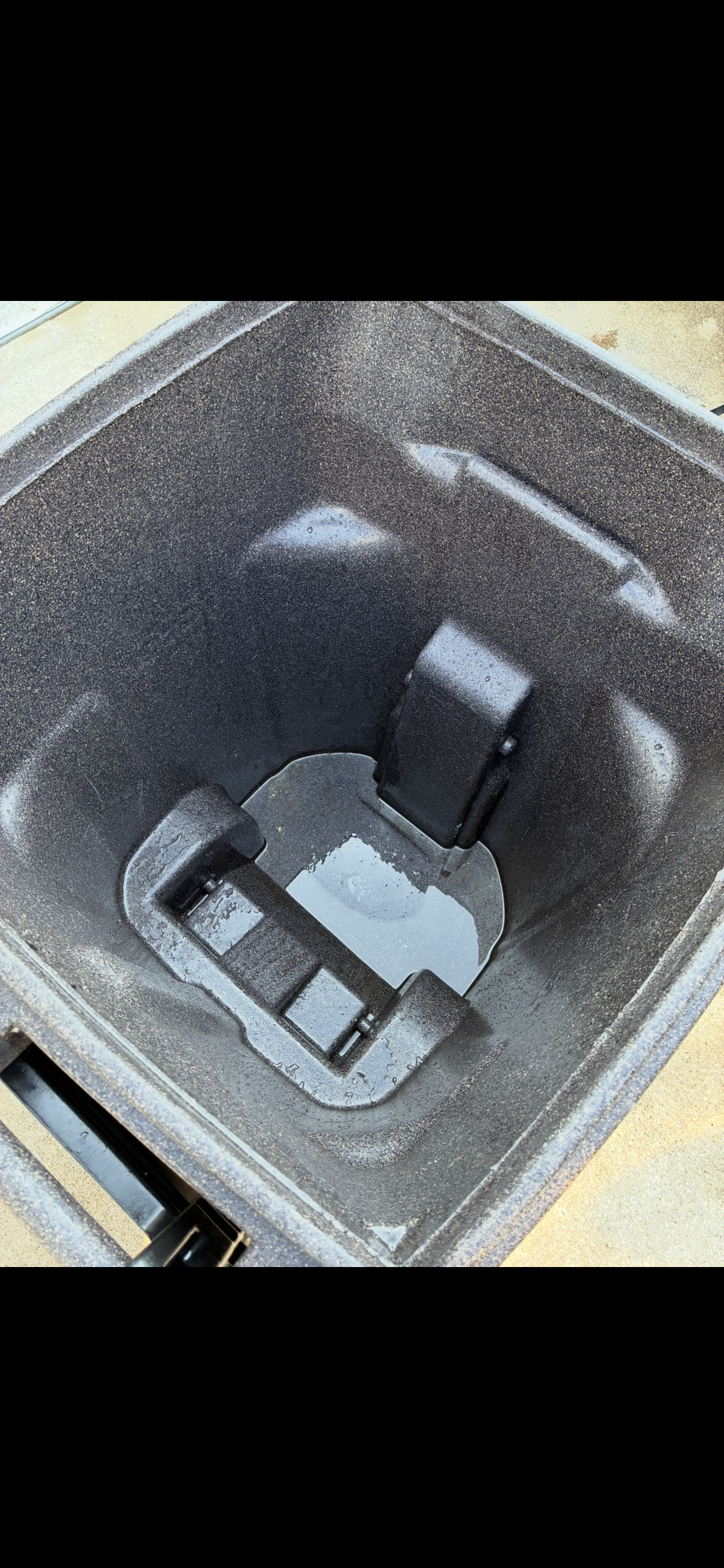 Clean trash bin interior after Harbor Bin Care hot water cleaning