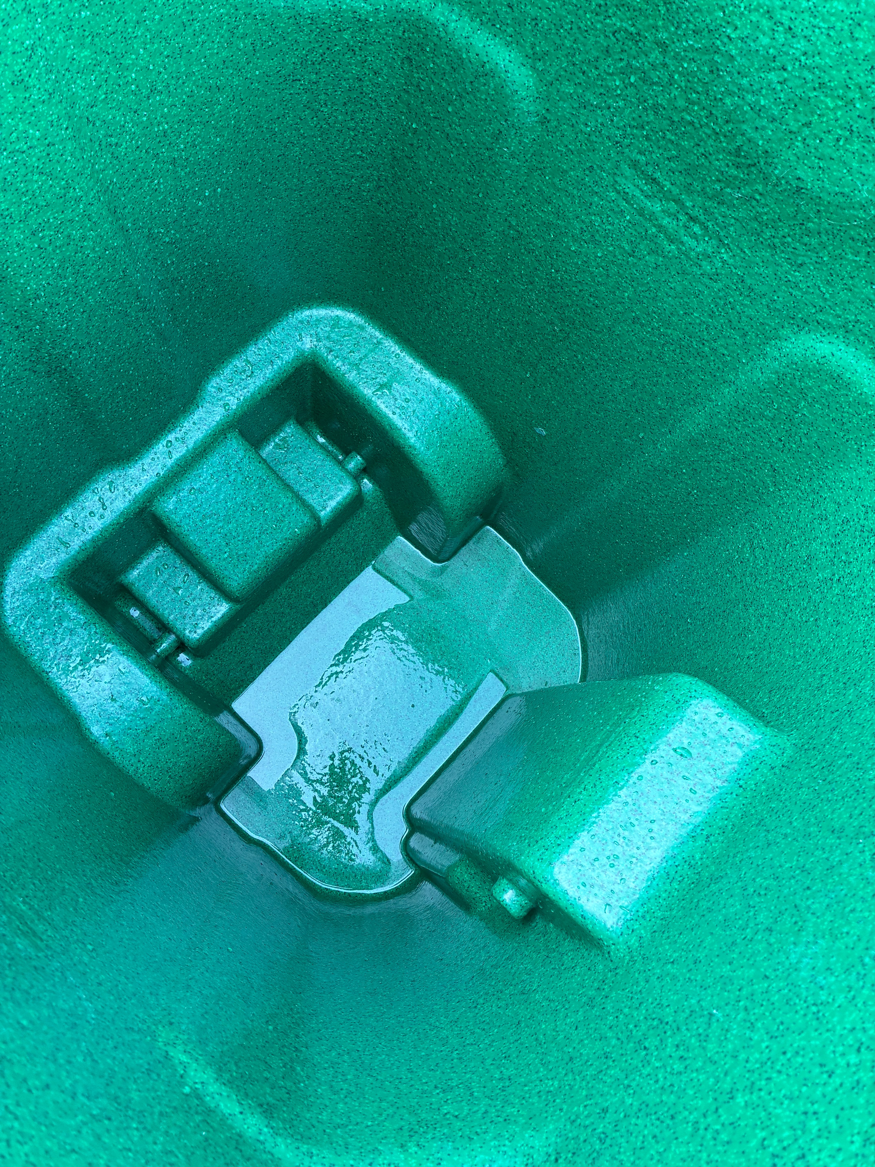 Close-up of a freshly cleaned bin interior — gleaming and sanitized